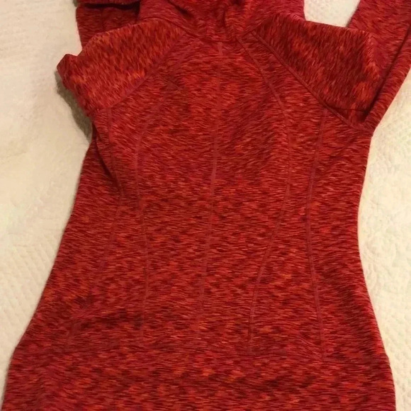 Athleta hoodie with two open pockets on front and zippered pocket on sleeve. - Picture 10 of 13